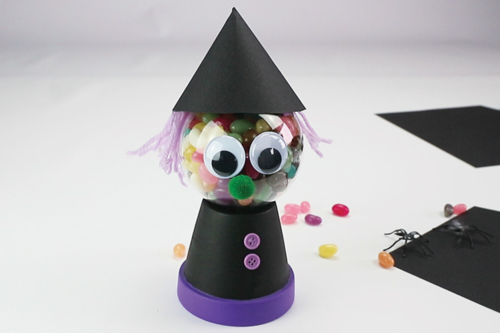 Sorcière distributeur de bonbons